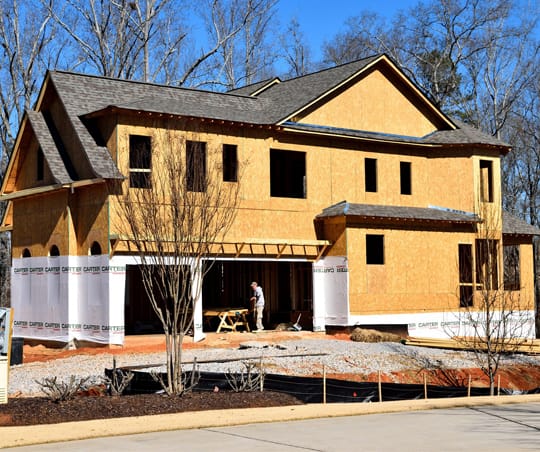 New Construction in the Madison Metro Area showing framing, sheathing and roof on